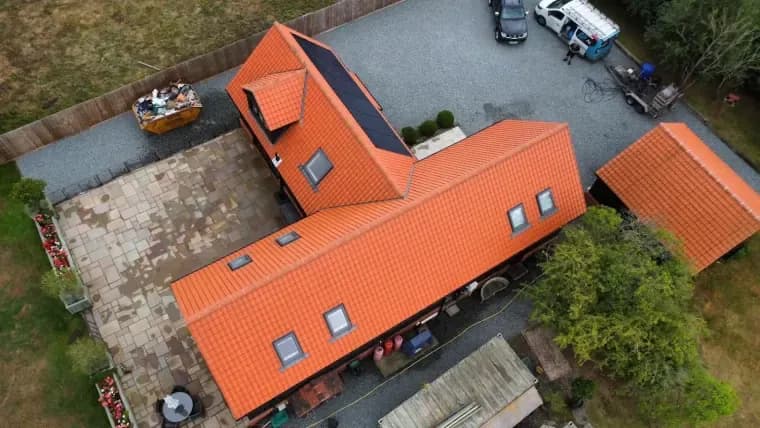 L-shaped tiled roof from above after cleaning
